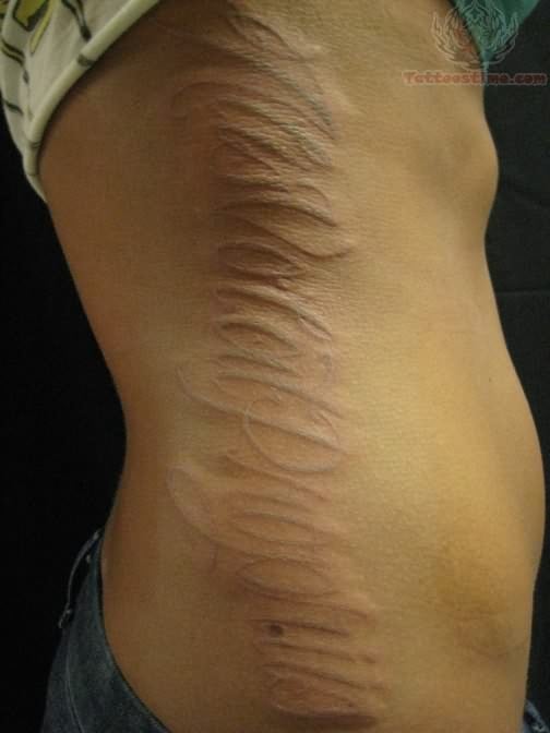 side rib and white ink tattoo 