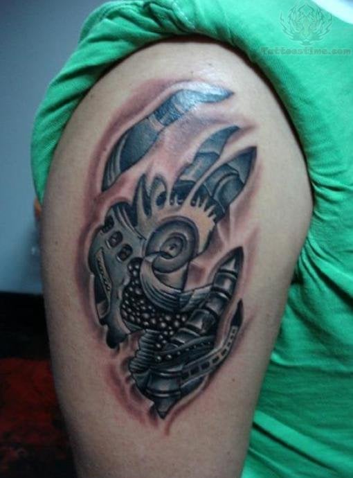 rip-skin-biomechanical-tattoo-on-shoulder