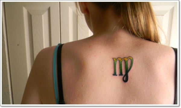 colorful Virgo tattoo on the back