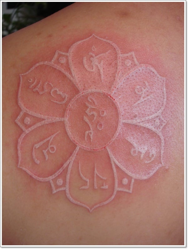 white ink lotus flower tattoo design
