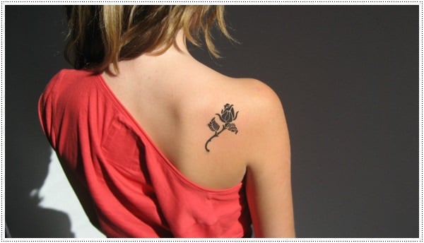medium sized flower silhouette works magically on the shoulder blade 
