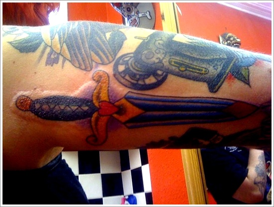 Daggers or knives tattoo design, idea 24