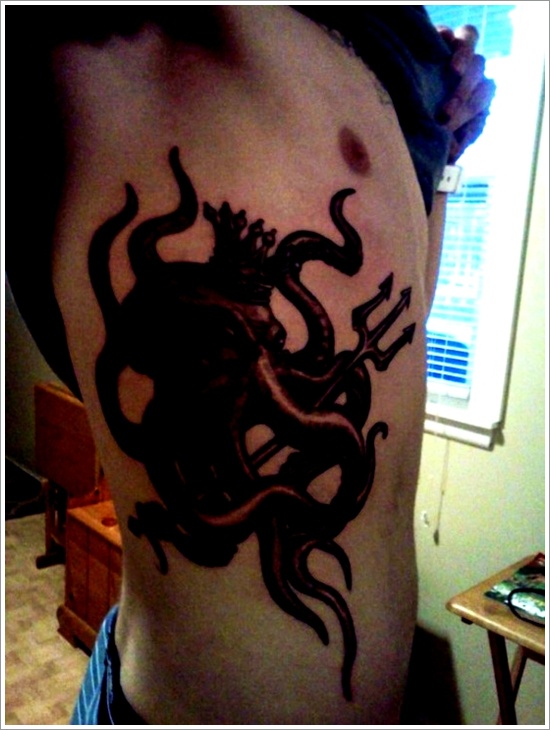 Tattoos featuring squid or octopus in design, idea 28