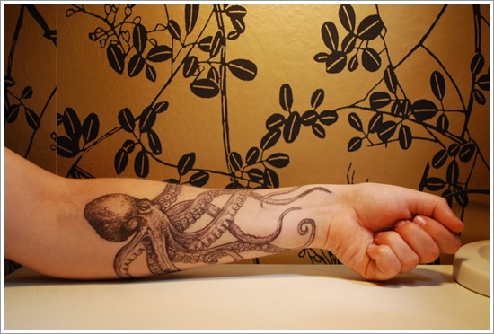 Tattoos featuring squid or octopus in design, idea 6