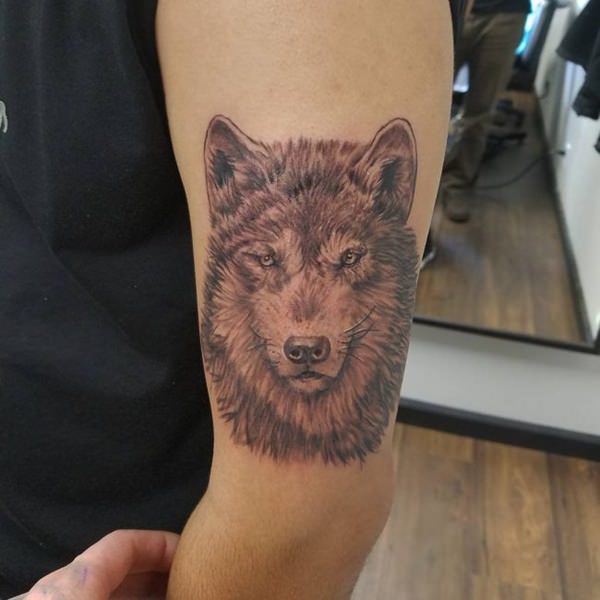 Meaningfull wolf tattoo design, idea 25
