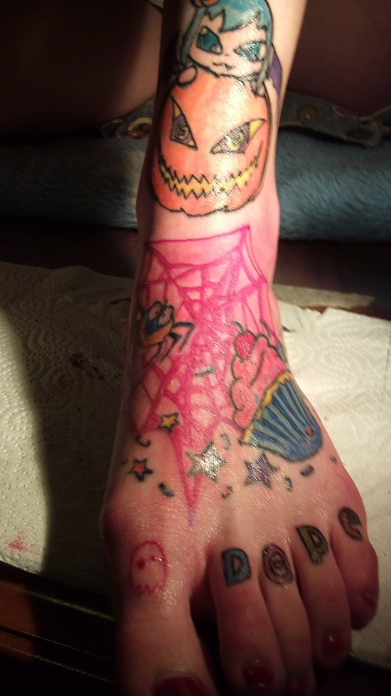 Evil looking pumpkin tattoos design, idea 17