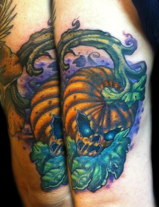 Evil looking pumpkin tattoos design, idea 18