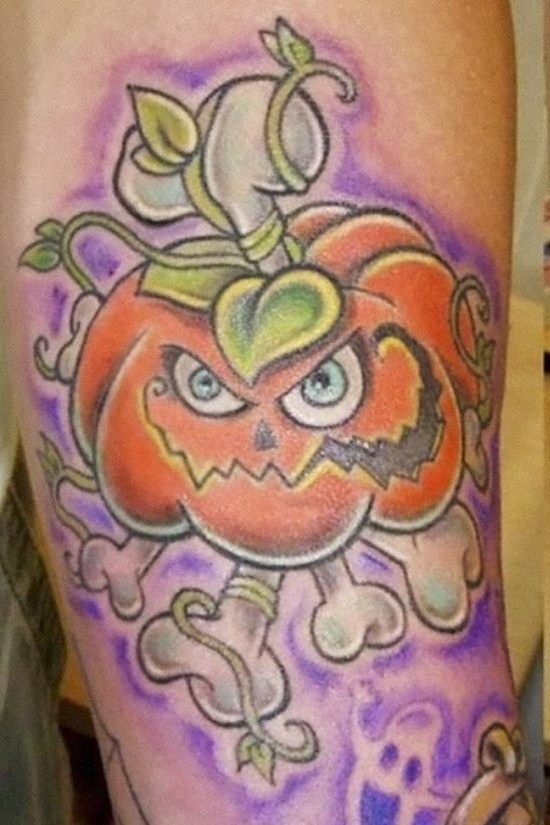Evil looking pumpkin tattoos design, idea 5