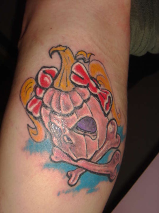 Evil looking pumpkin tattoos design, idea 20