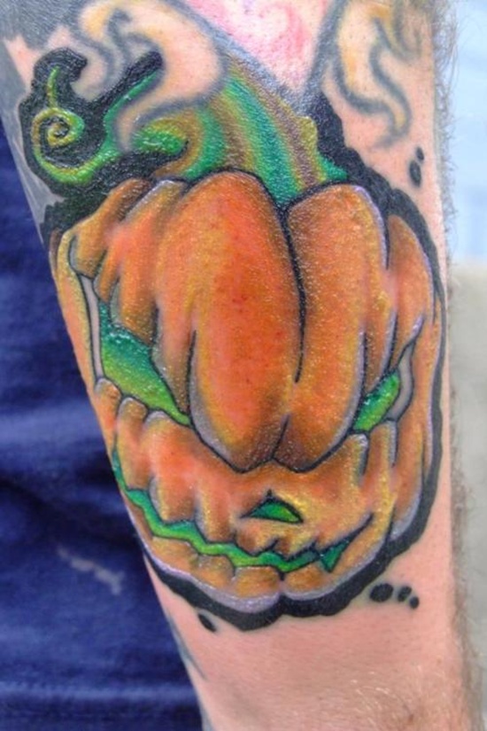 Evil looking pumpkin tattoos design, idea 23