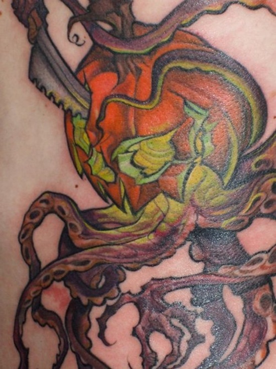 Evil looking pumpkin tattoos design, idea 24