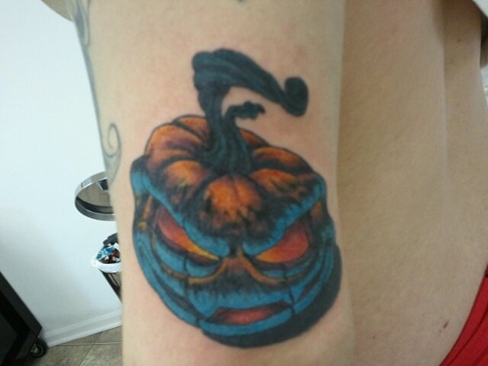 Evil looking pumpkin tattoos design, idea 11