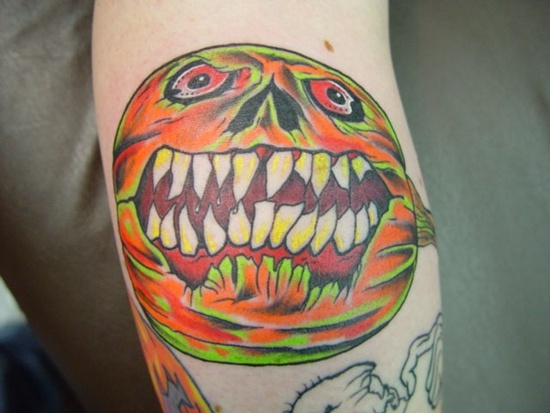 Evil looking pumpkin tattoos design, idea 8