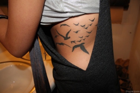 Tattoos showing bird flocks design, idea 13