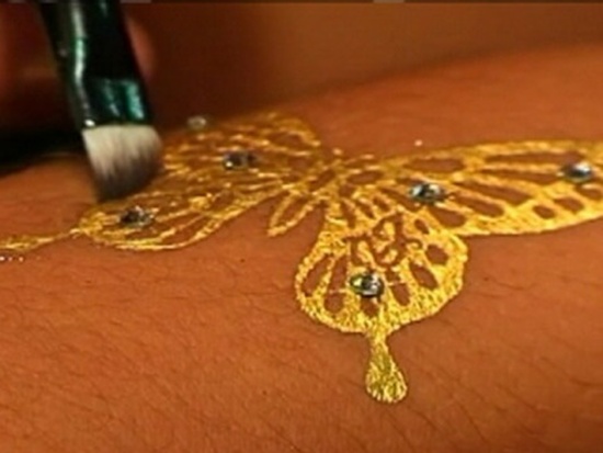 Fancy and glittery gold tattoos design, idea 6