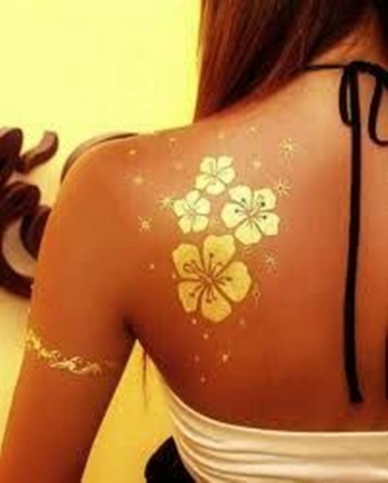 Fancy and glittery gold tattoos design, idea 2
