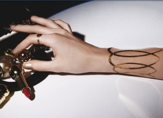 Fancy and glittery gold tattoos design, idea 4