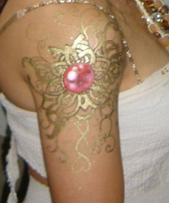 Fancy and glittery gold tattoos design, idea 7