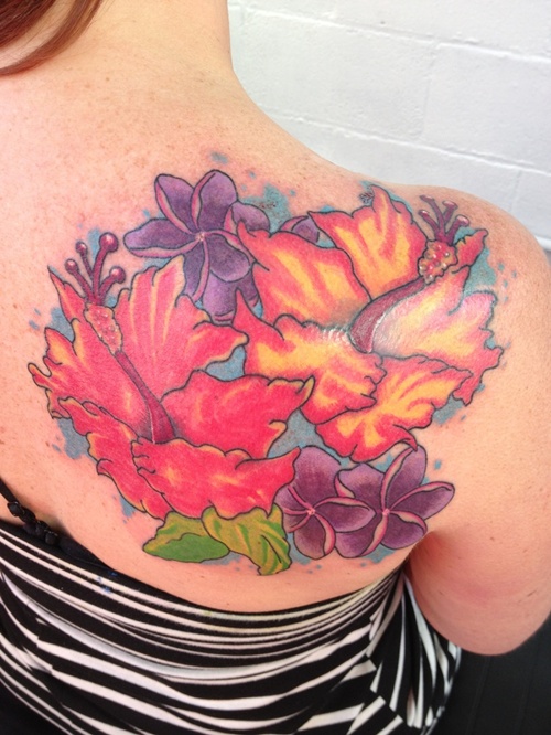 Tattoos with the hibiscus flower in their design, idea 16