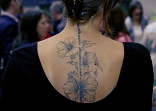 Tattoos with the hibiscus flower in their design, idea 22