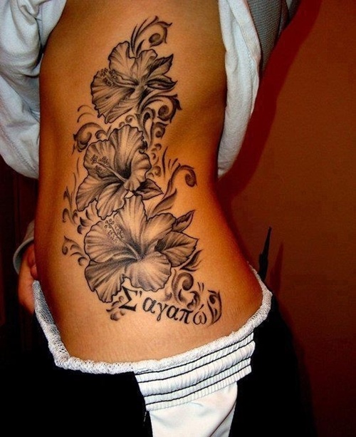 Tattoos with the hibiscus flower in their design, idea 5