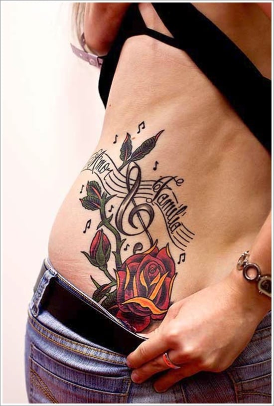 Single needle treble clef rose tattoo on the inner