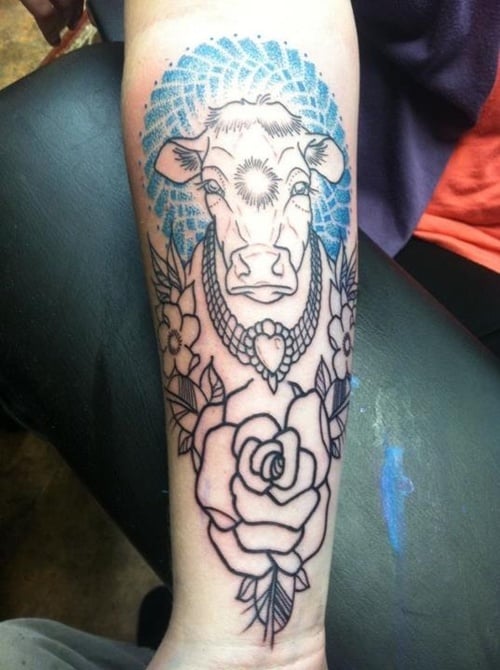 Premium Vector  Black and white tribal decorative cow pattern tattoo