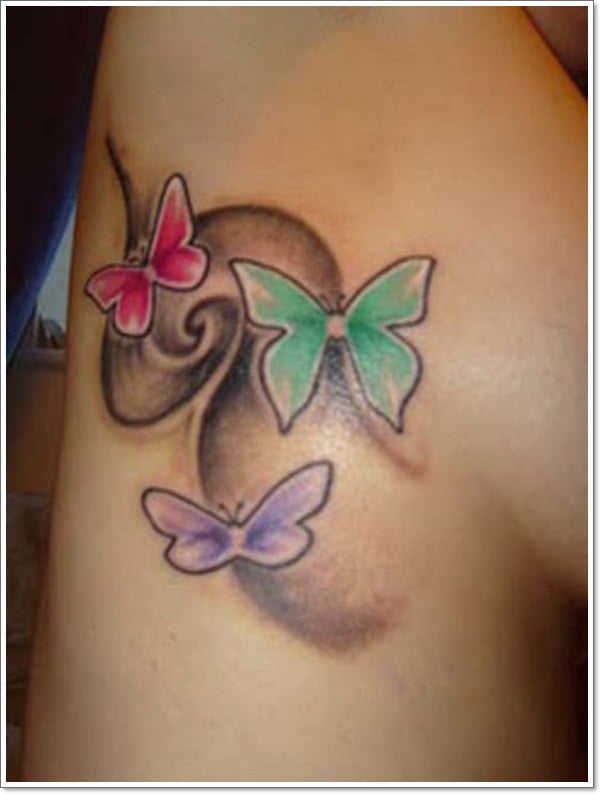 colored-butterfly-tattoos-on-side-rib