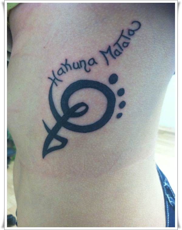 Minimalist hakuna matata symbol tattoo on the ankle