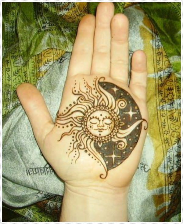 A womans hand with a henna Mehndi flower tattoo touches a mans hand with  a henna Mehndi sun tattoo  Stock Image  Everypixel