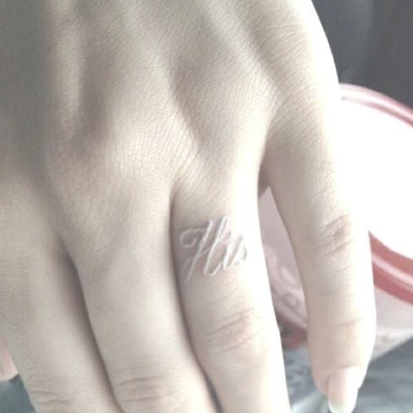 finger tattoos white ink
