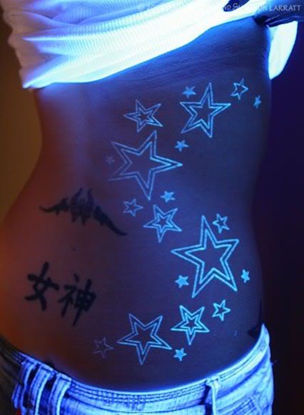 24 Star Tattoos On Stomach