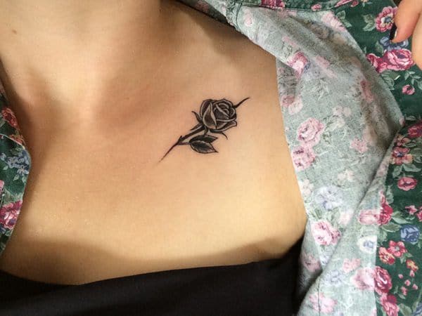 Dove Rose Tattoo On Man Chest by Tattoo Mini