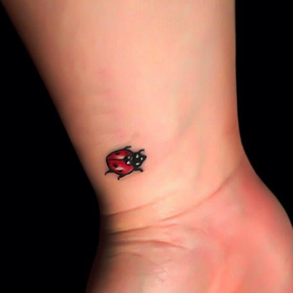 Small beetle tattoo designs are very suitable placed on the wrist, because it would be easy to hide with a watch that we wear. This design is very cute to wear a girl who is afraid to show off her tattoo.