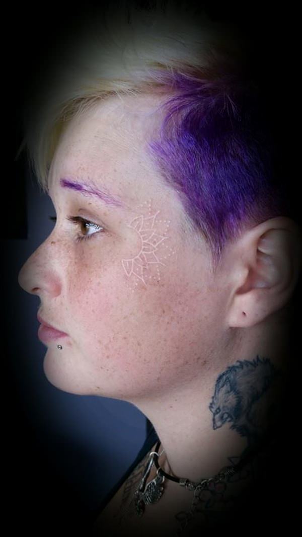 Woman Tattoos Freckles On Face