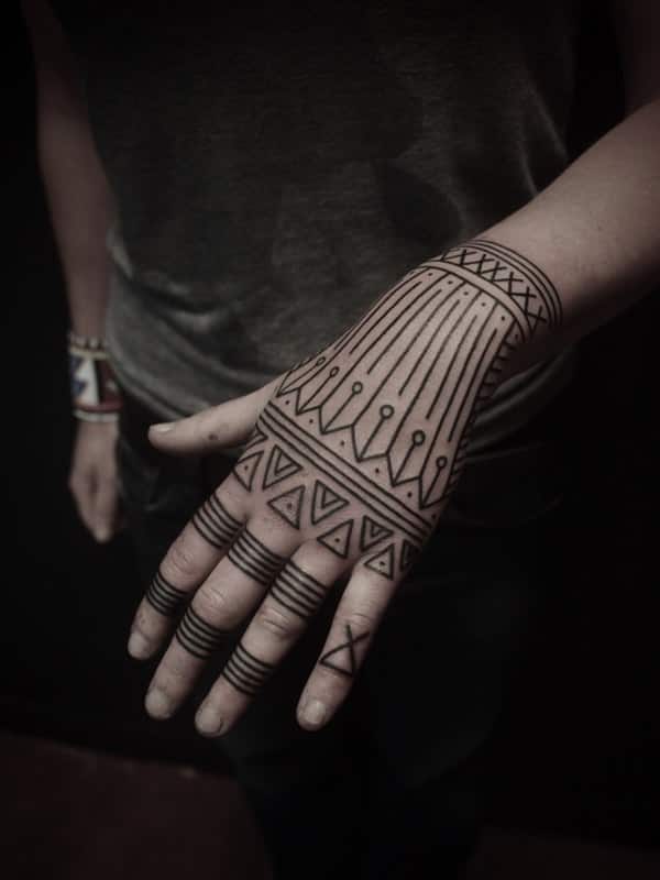 simple tribal hand tattoo