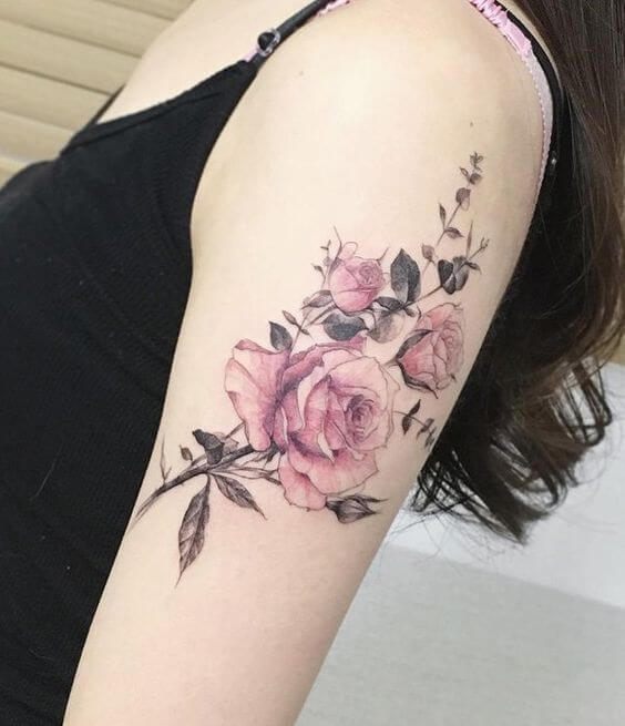 Delicate pink rose tattoo on the arm  Tattoogridnet