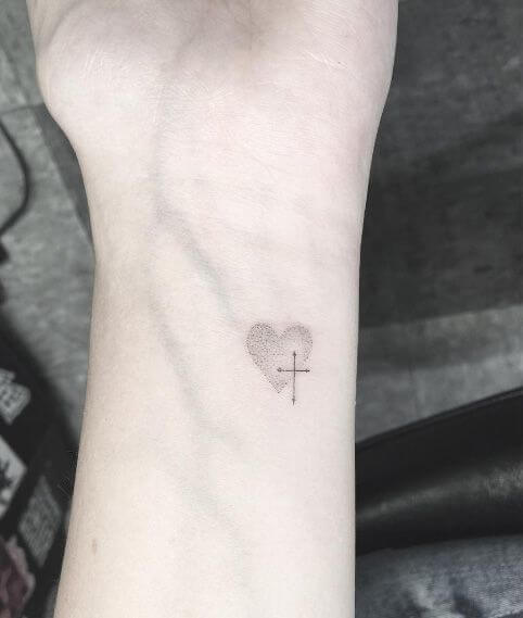 Tiny cross tattoo by Conz Thomas  Tattoogridnet