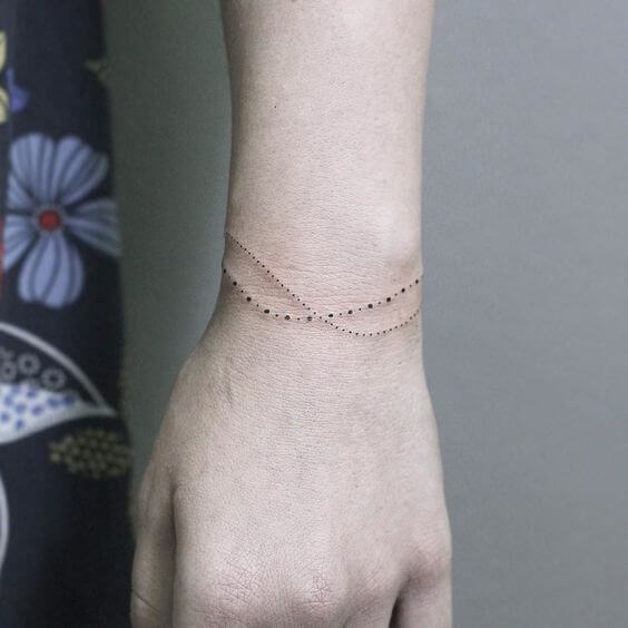 28 Wonderful Bracelet Tattoo Designs for Women | Wrist bracelet tattoo, Tattoo  bracelet, Charm bracelet tattoo